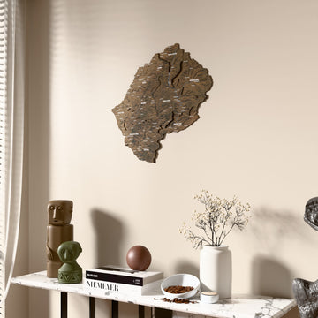 Satellite Lesotho wooden wall map beside a sheer curtain, angled view