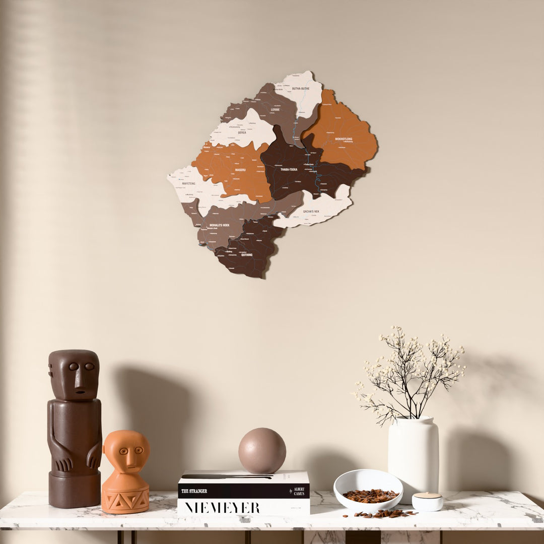 Soil Lesotho wooden wall map above a marble console, front view