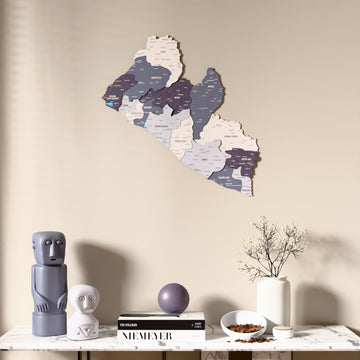 Nimbus Liberia wooden wall map above a marble console, front view