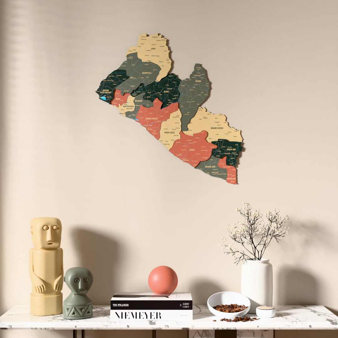 Sage Liberia wooden wall map above a marble console, front view