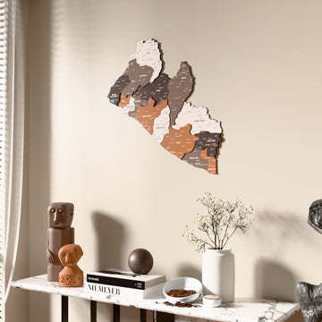 Soil Liberia wooden wall map beside a sheer curtain, angled view