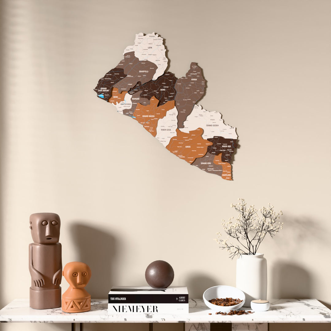 Soil Liberia wooden wall map above a marble console, front view