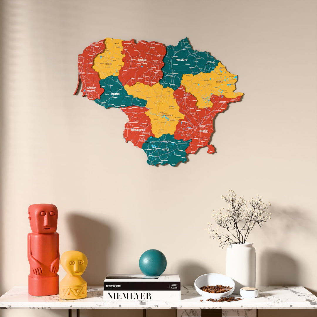 Flag colored Lithuania wooden wall map above a marble console, front view