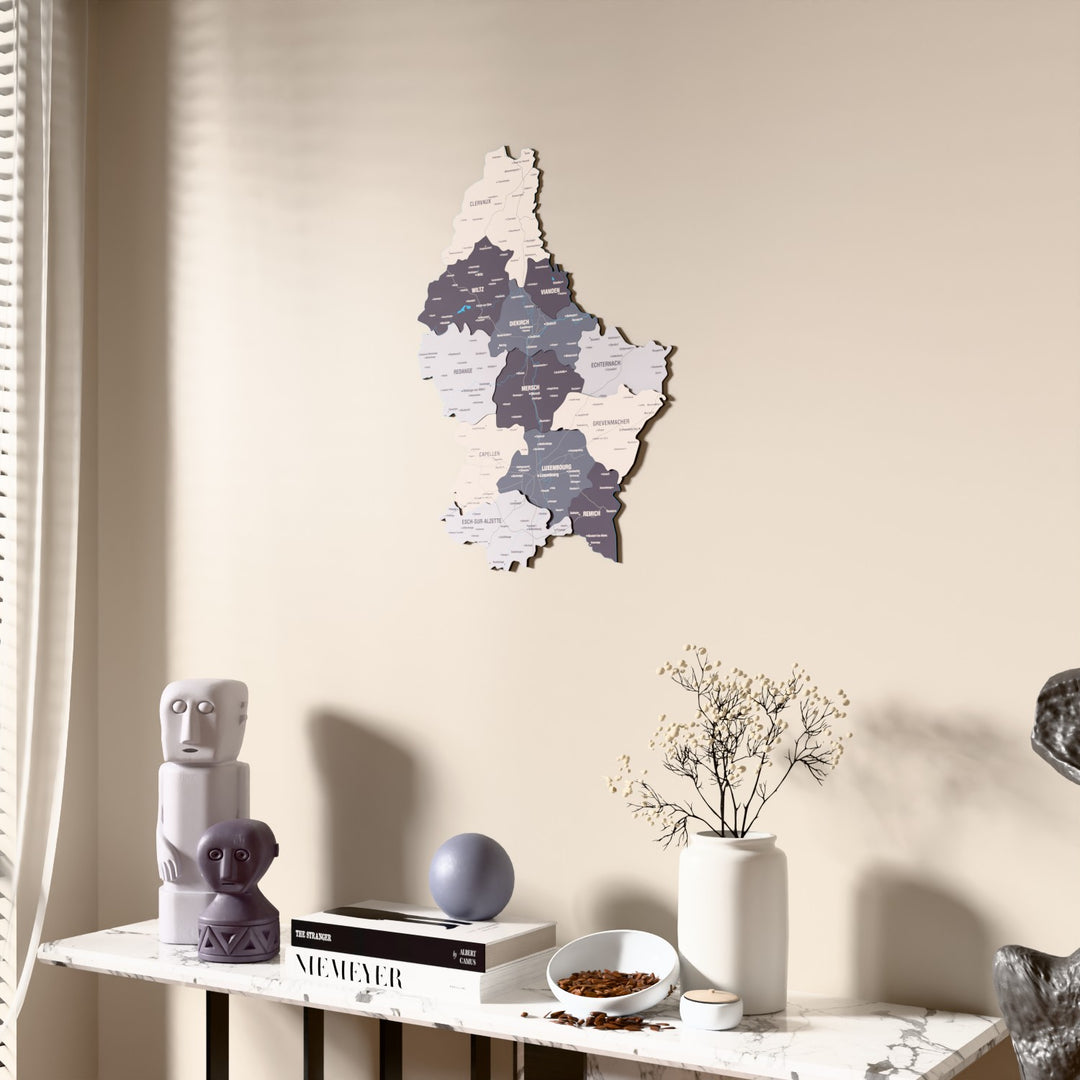 Nimbus Luxembourg wooden wall map beside a sheer curtain, angled view