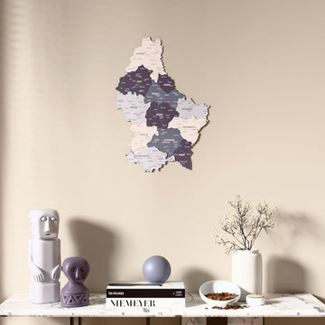 Nimbus Luxembourg wooden wall map above a marble console, front view