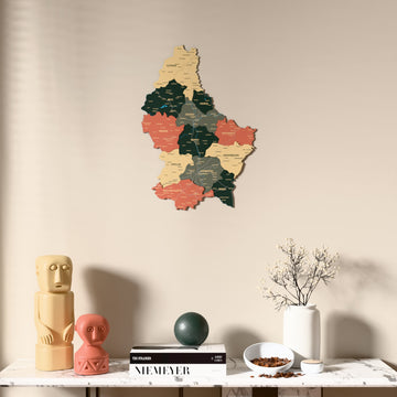 Sage Luxembourg wooden wall map above a marble console, front view