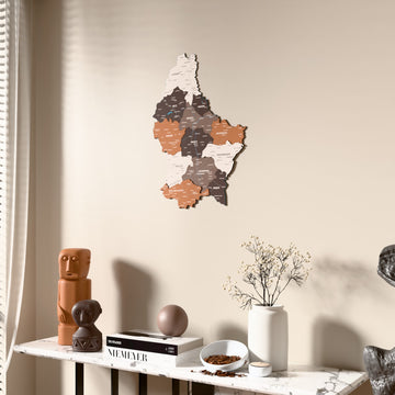Soil Luxembourg wooden wall map beside a sheer curtain, angled view