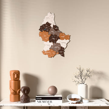 Soil Luxembourg wooden wall map above a marble console, front view