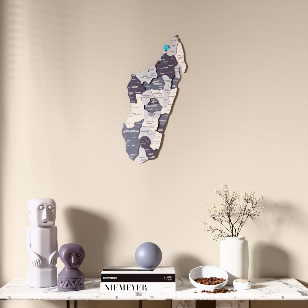 Nimbus Madagascar wooden wall map above a marble console, front view