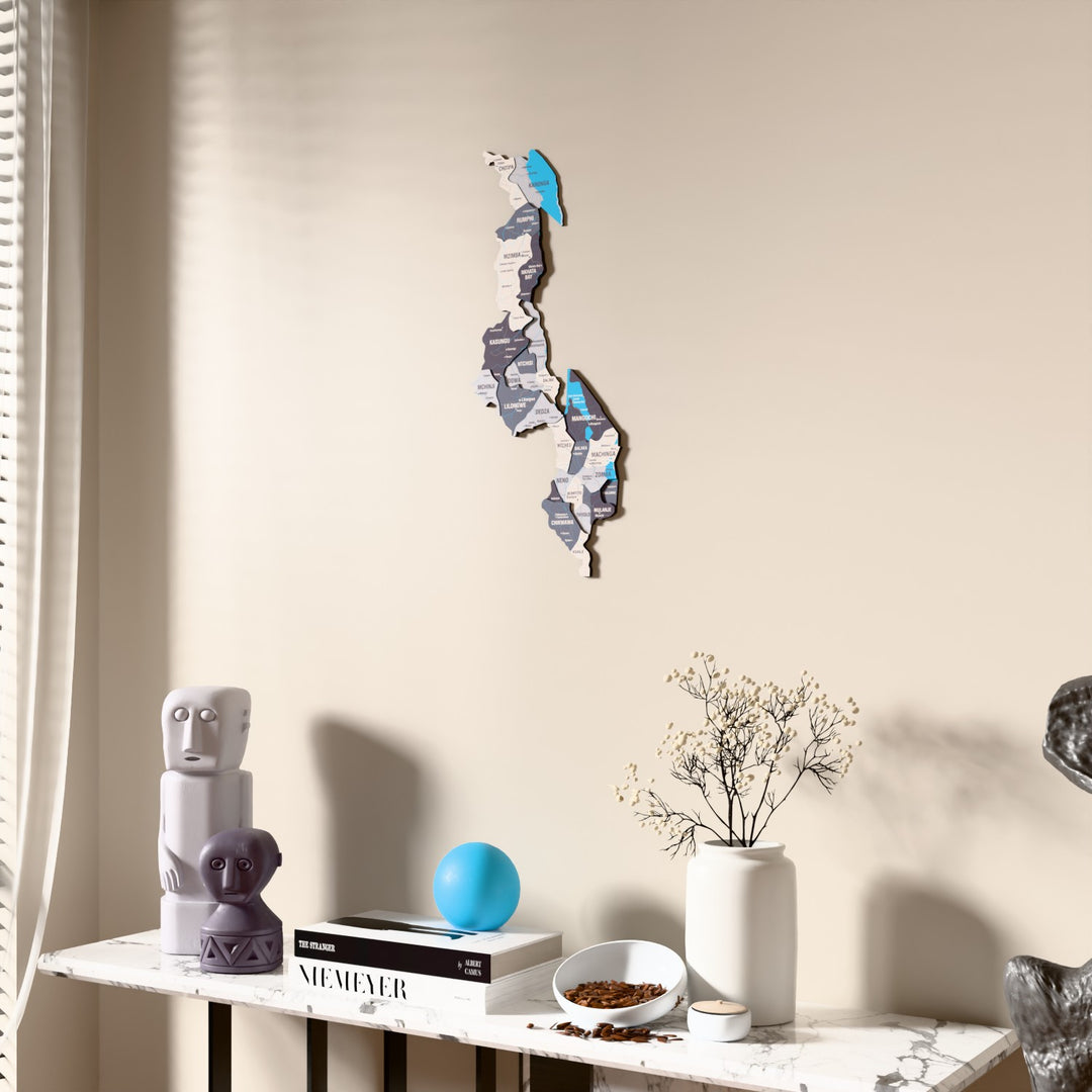 Nimbus Malawi wooden wall map beside a sheer curtain, angled view