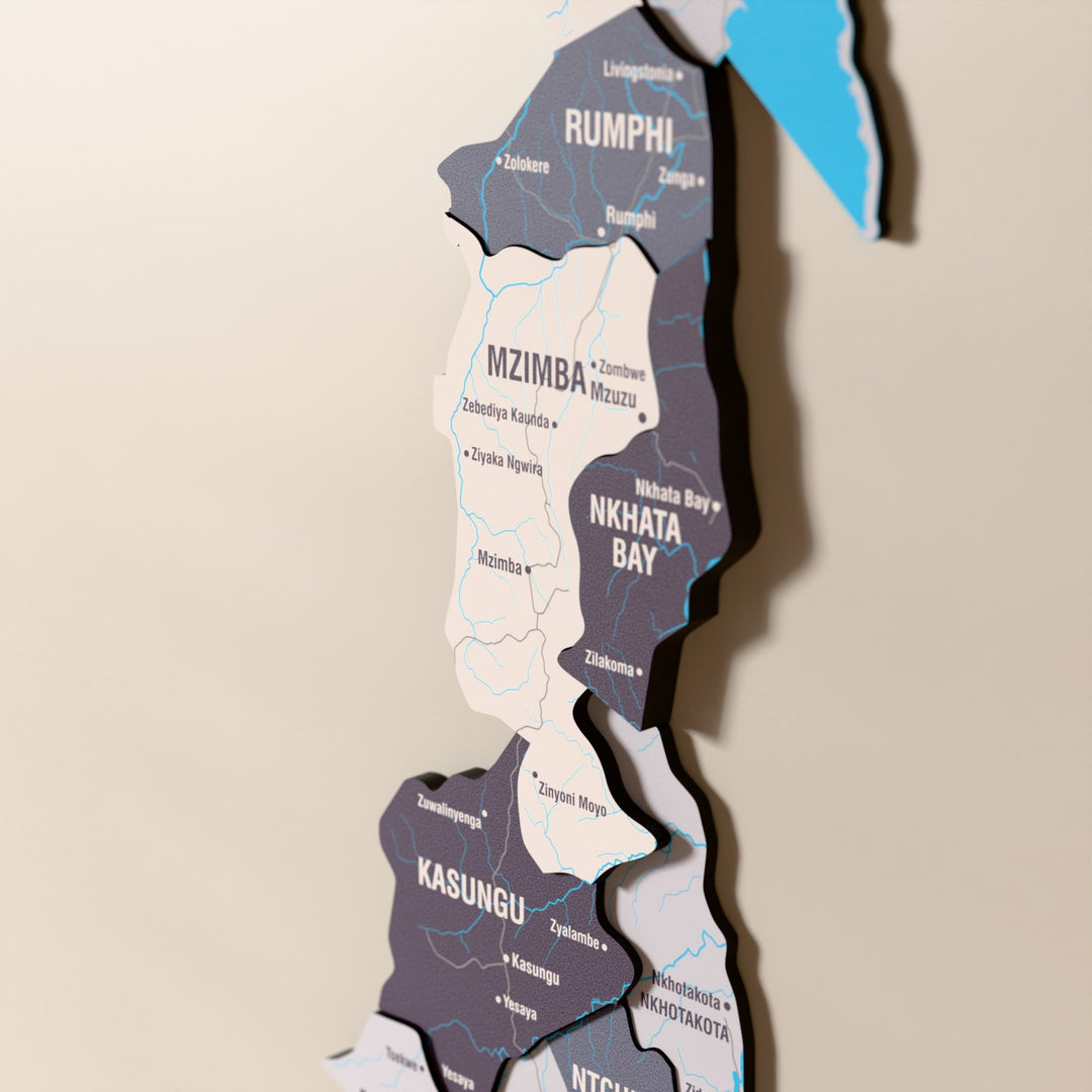Close-up of the Nimbus Malawi wooden wall map with layered regions and printed names