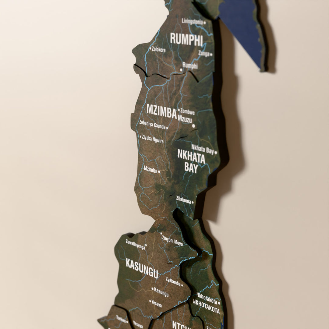 Close-up of the Satellite Malawi wooden wall map with layered regions and printed names