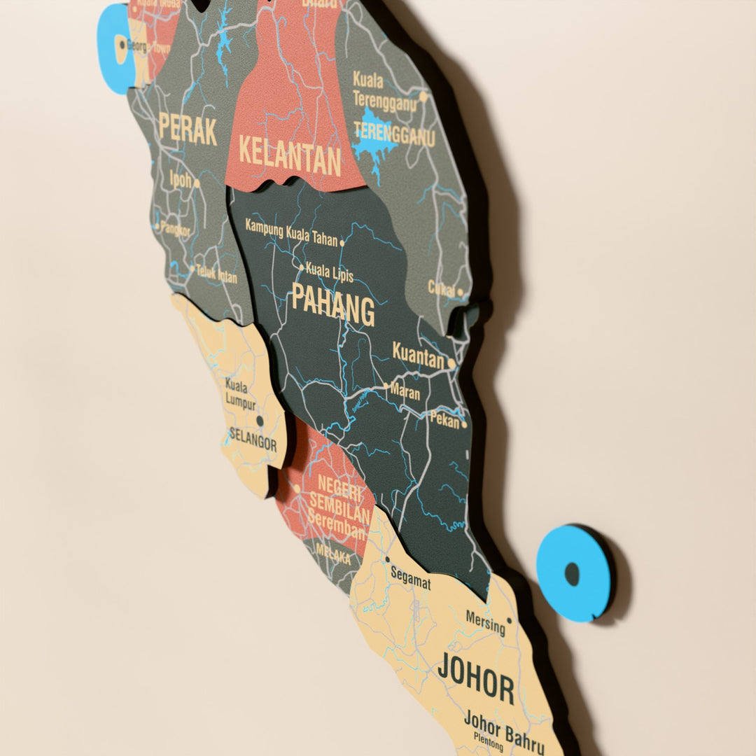 Close-up of the Sage Malaysia wooden wall map with layered regions and printed names
