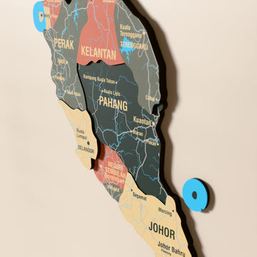 Close-up of the Sage Malaysia wooden wall map with layered regions and printed names