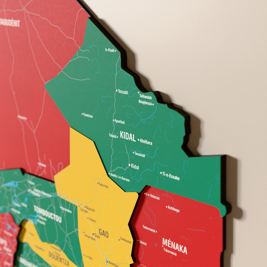 Close-up of the Flag colored Mali wooden wall map with layered regions and printed names