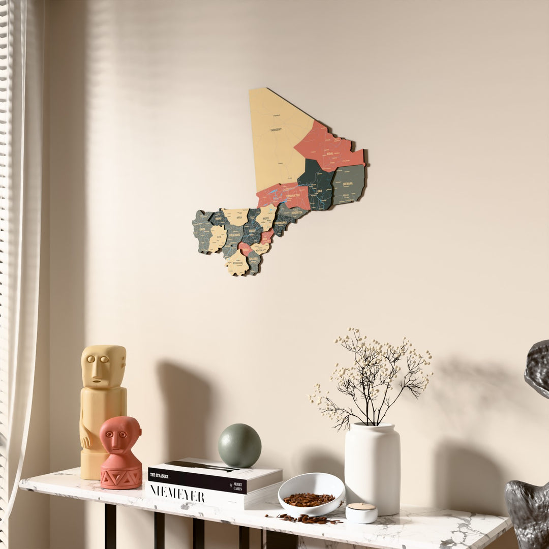 Sage Mali wooden wall map beside a sheer curtain, angled view