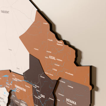 Close-up of the Soil Mali wooden wall map with layered regions and printed names