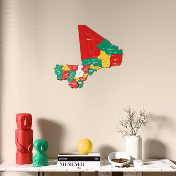 Flag colored Mali wooden wall map above a marble console, front view