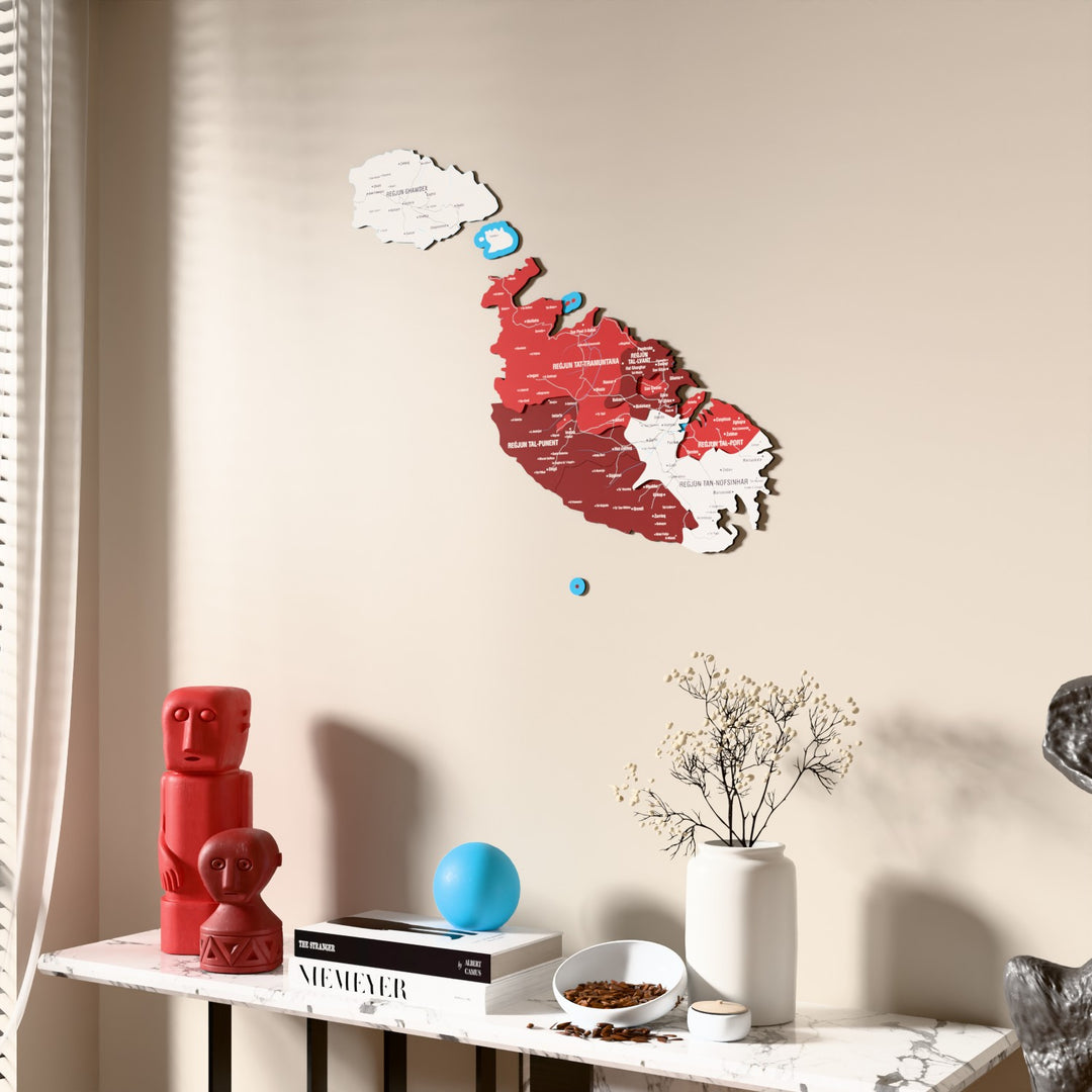 Flag colored Malta wooden wall map beside a sheer curtain, angled view