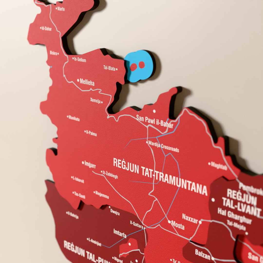 Close-up of the Flag colored Malta wooden wall map with layered regions and printed names