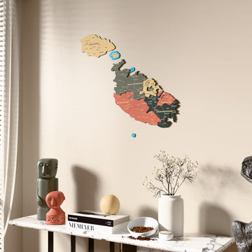 Sage Malta wooden wall map beside a sheer curtain, angled view