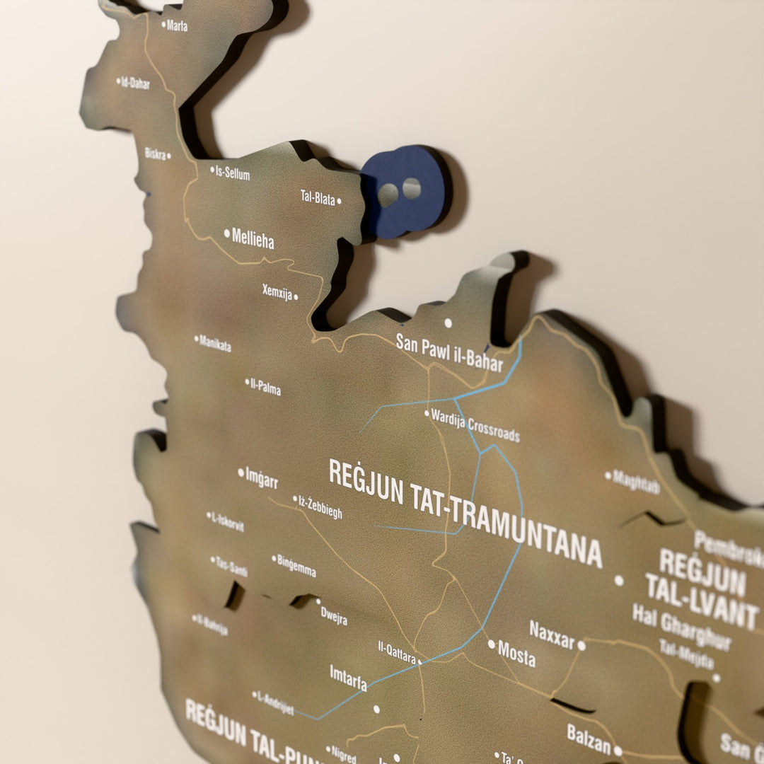 Close-up of the Satellite Malta wooden wall map with layered regions and printed names