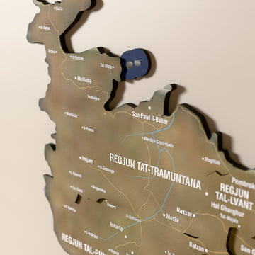 Close-up of the Satellite Malta wooden wall map with layered regions and printed names