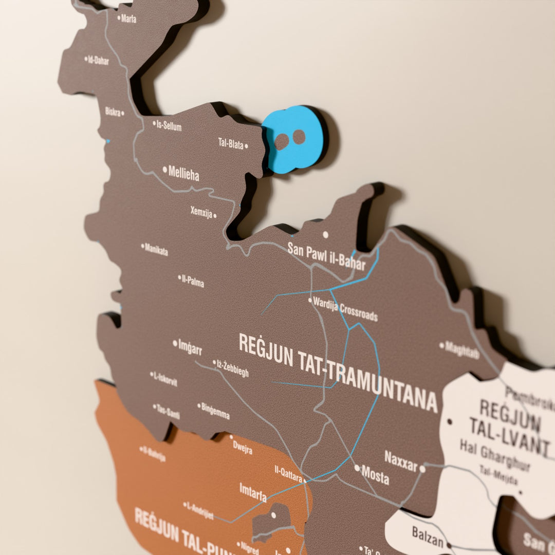Close-up of the Soil Malta wooden wall map with layered regions and printed names
