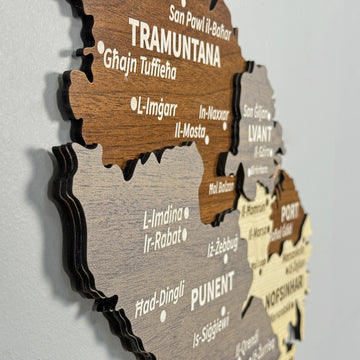 Close-up of Tramuntana, Punent and Port regions on the layered wooden Malta map