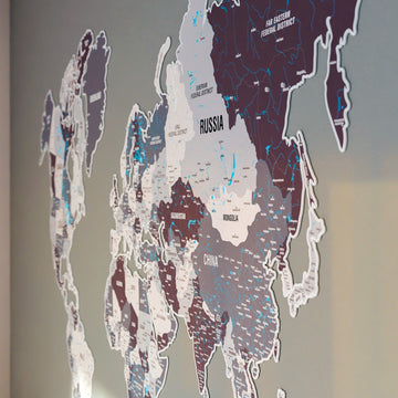 Side-angle close-up of Asia on the Nimbus metal world map, showing Russia, Mongolia and China
