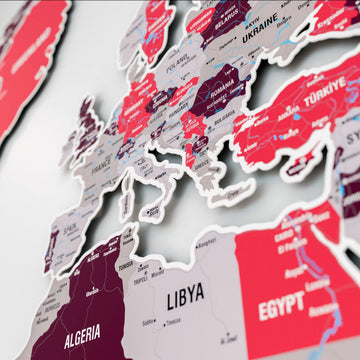 Close-up of Europe, Türkiye and North Africa on the crimson metal world map