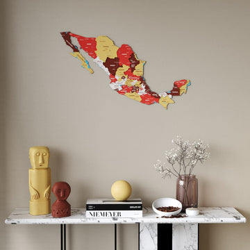 Terra Mexico wooden wall map in red, maroon and mustard states above a marble console table, front view