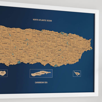Large angled close-up of a white-framed Puerto Rico cork map with Mona, Vieques and Culebra insets