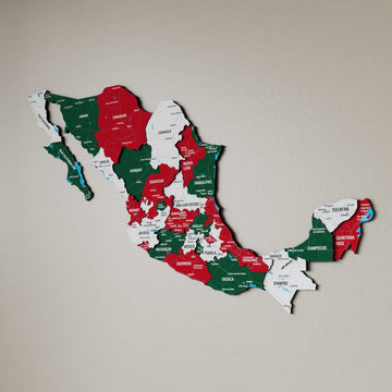 Flag color Mexico wooden wall map in green, red and white states on a beige wall, angled view showing the layered pieces