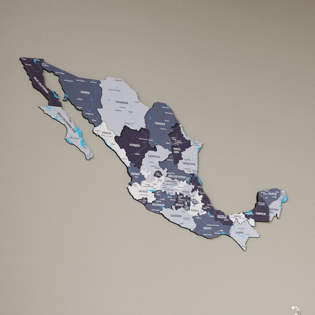 Nimbus Mexico wooden wall map in slate gray and purple tones on a beige wall, angled view showing the layered pieces