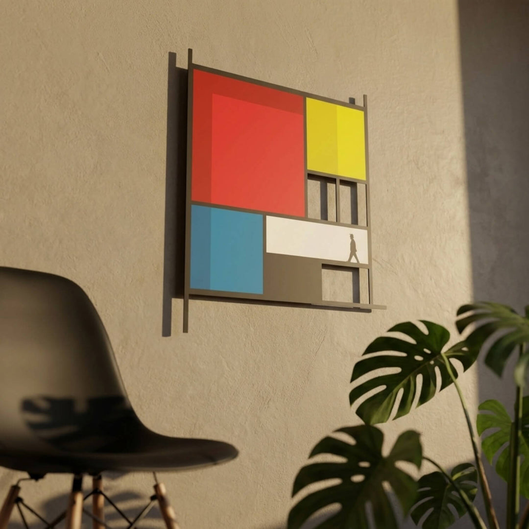 Mondrian-style metal wall art at an angle with a black chair and monstera leaf