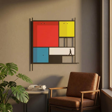 Mondrian-style metal wall art in a corner with a leather armchair and plant