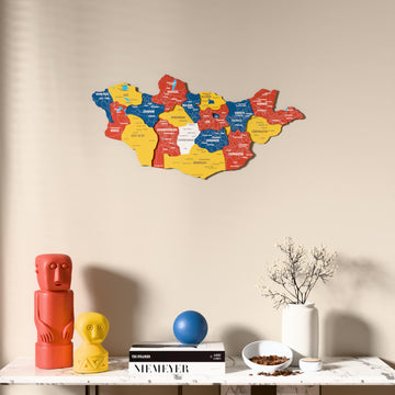 Flag colored Mongolia wooden wall map above a marble console, front view