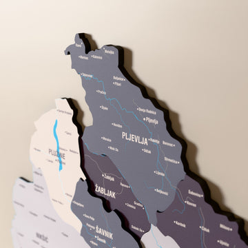 Close-up of the Nimbus Montenegro wooden wall map with layered regions and printed names