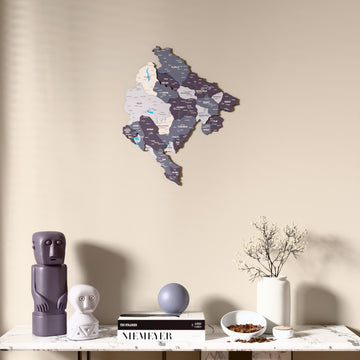 Nimbus Montenegro wooden wall map above a marble console, front view