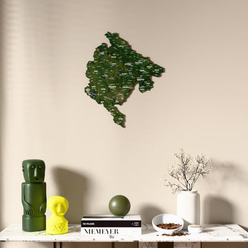 Satellite Montenegro wooden wall map above a marble console, front view