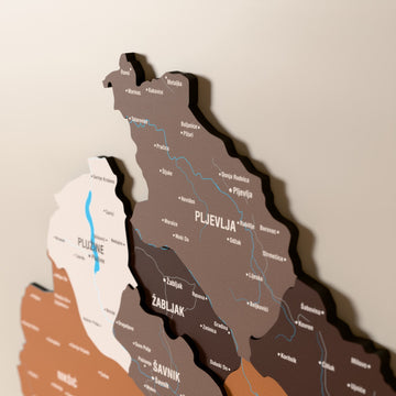 Close-up of the Soil Montenegro wooden wall map with layered regions and printed names