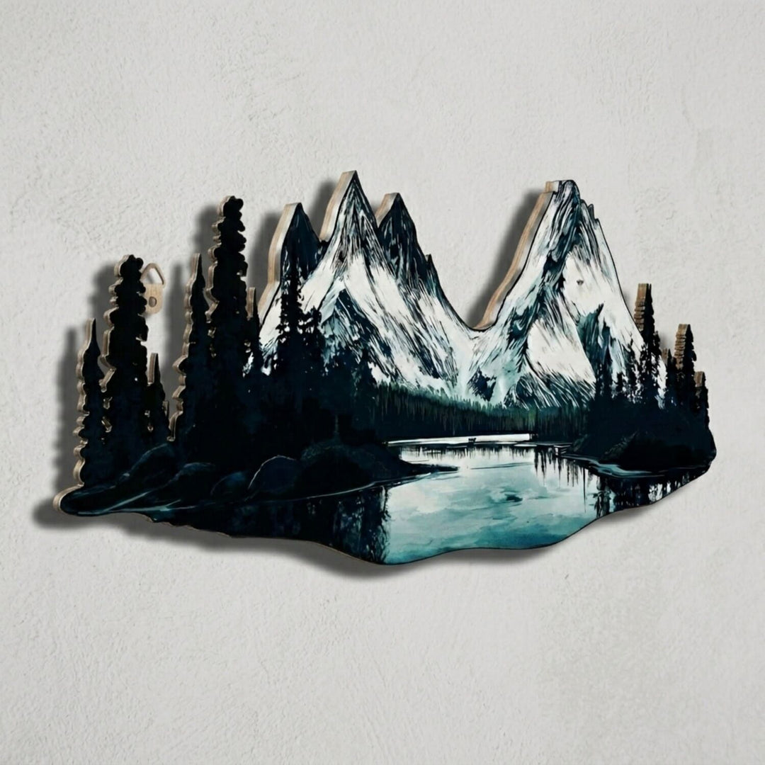 Close-up of the snowy peaks, pine trees and river reflection