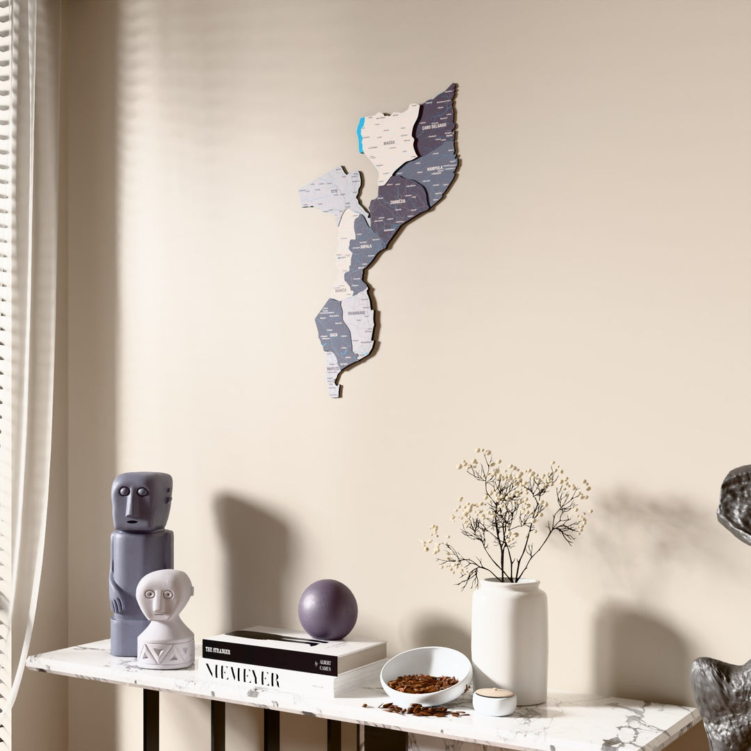Nimbus Mozambique wooden wall map beside a sheer curtain, angled view