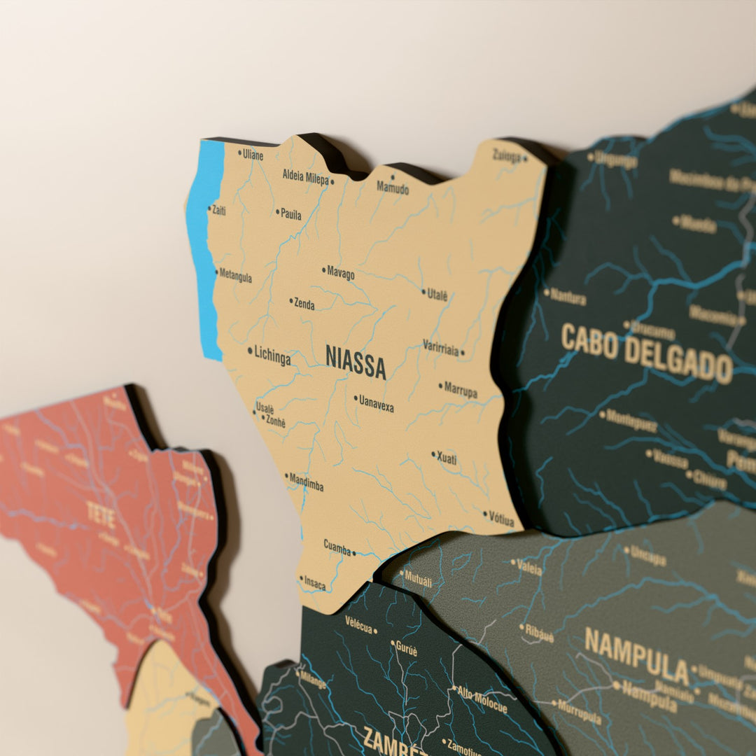 Close-up of the Sage Mozambique wooden wall map with layered regions and printed names