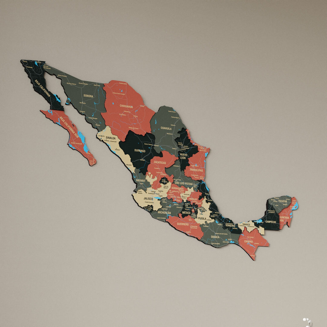 Sage Mexico wooden wall map in dark green, tan and salmon states on a beige wall, angled view showing the layered pieces