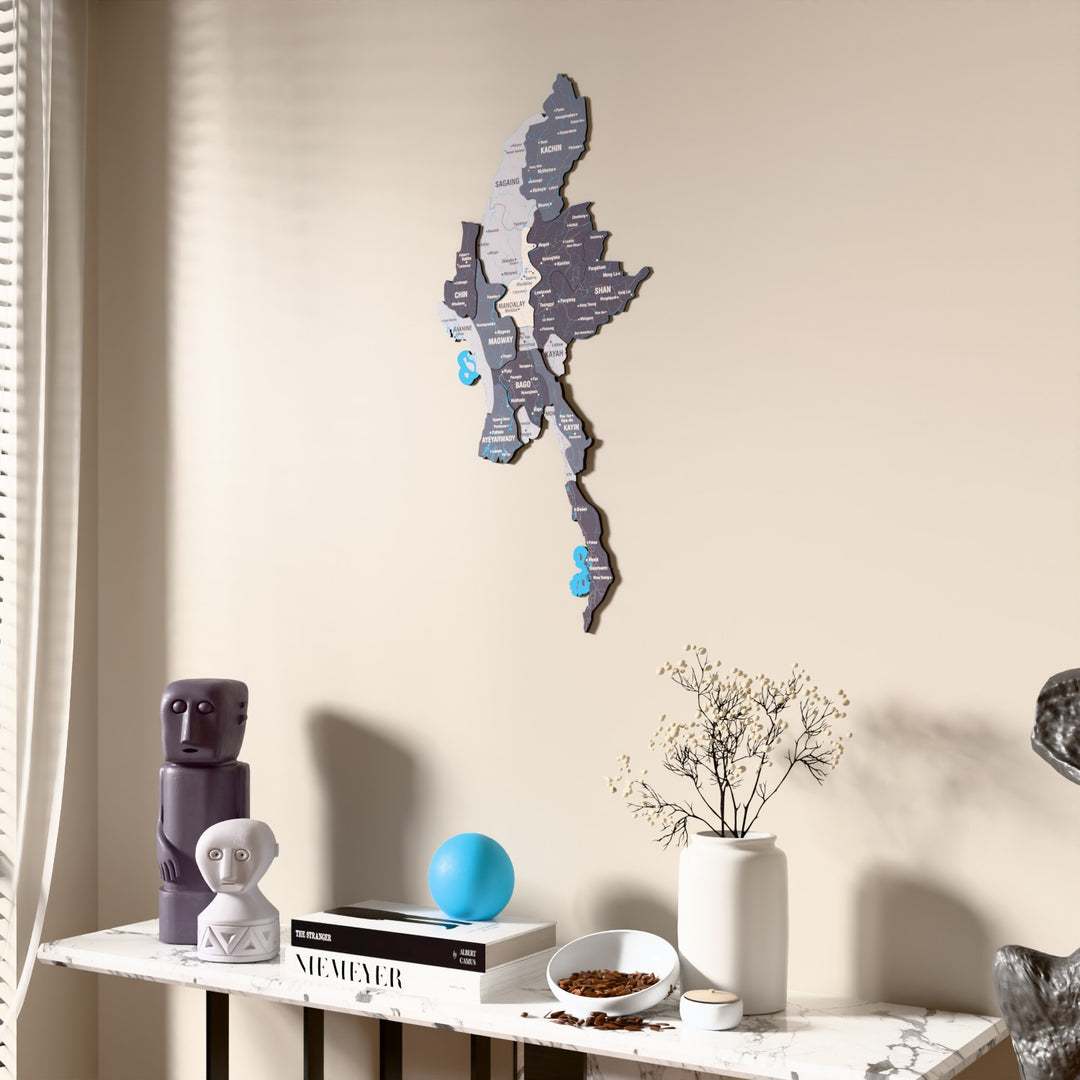 Nimbus Myanmar wooden wall map beside a sheer curtain, angled view