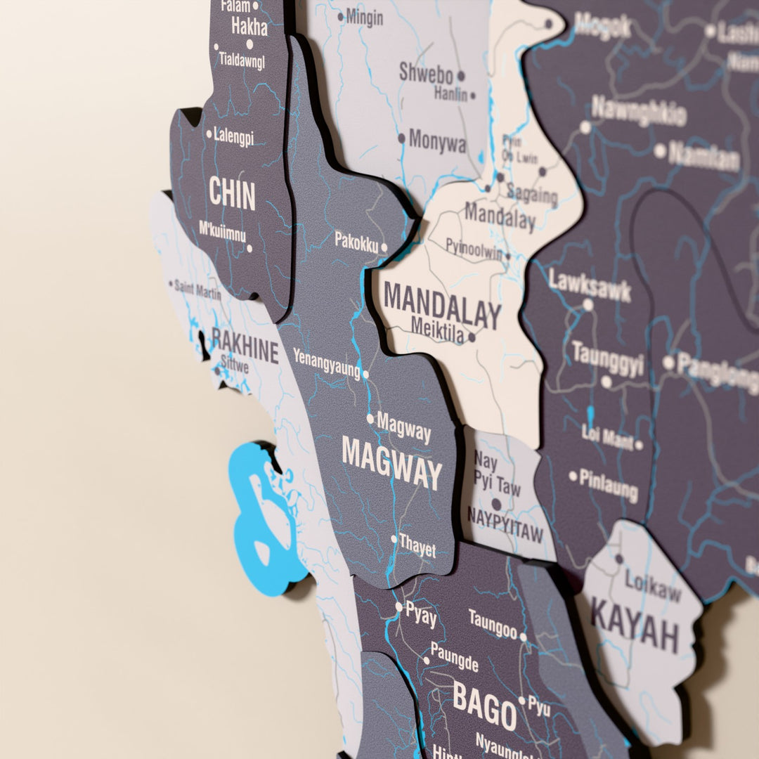 Close-up of the Nimbus Myanmar wooden wall map with layered regions and printed names