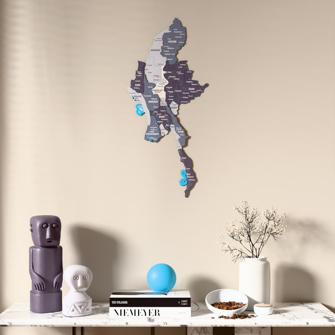 Nimbus Myanmar wooden wall map above a marble console, front view