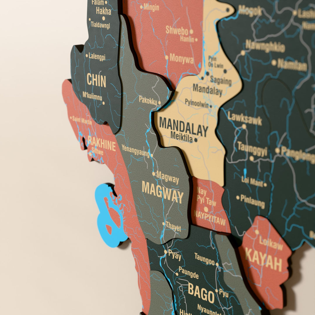 Close-up of the Sage Myanmar wooden wall map with layered regions and printed names
